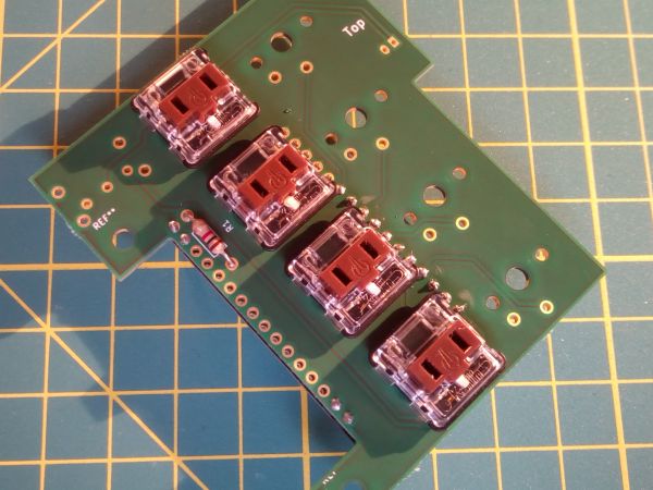 board top, 4 keys and resistor are soldered in front of the LolinD32